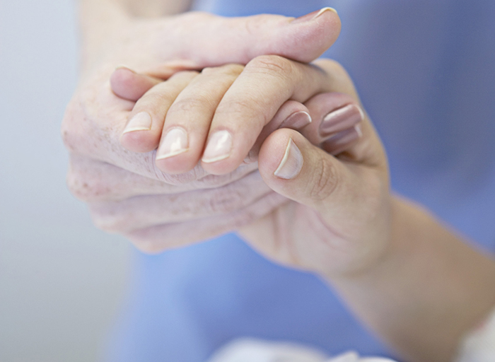 nurse comforting patient